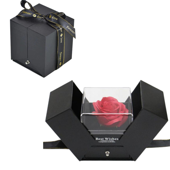 Caja de regalo con cinta y rosa auténtica.